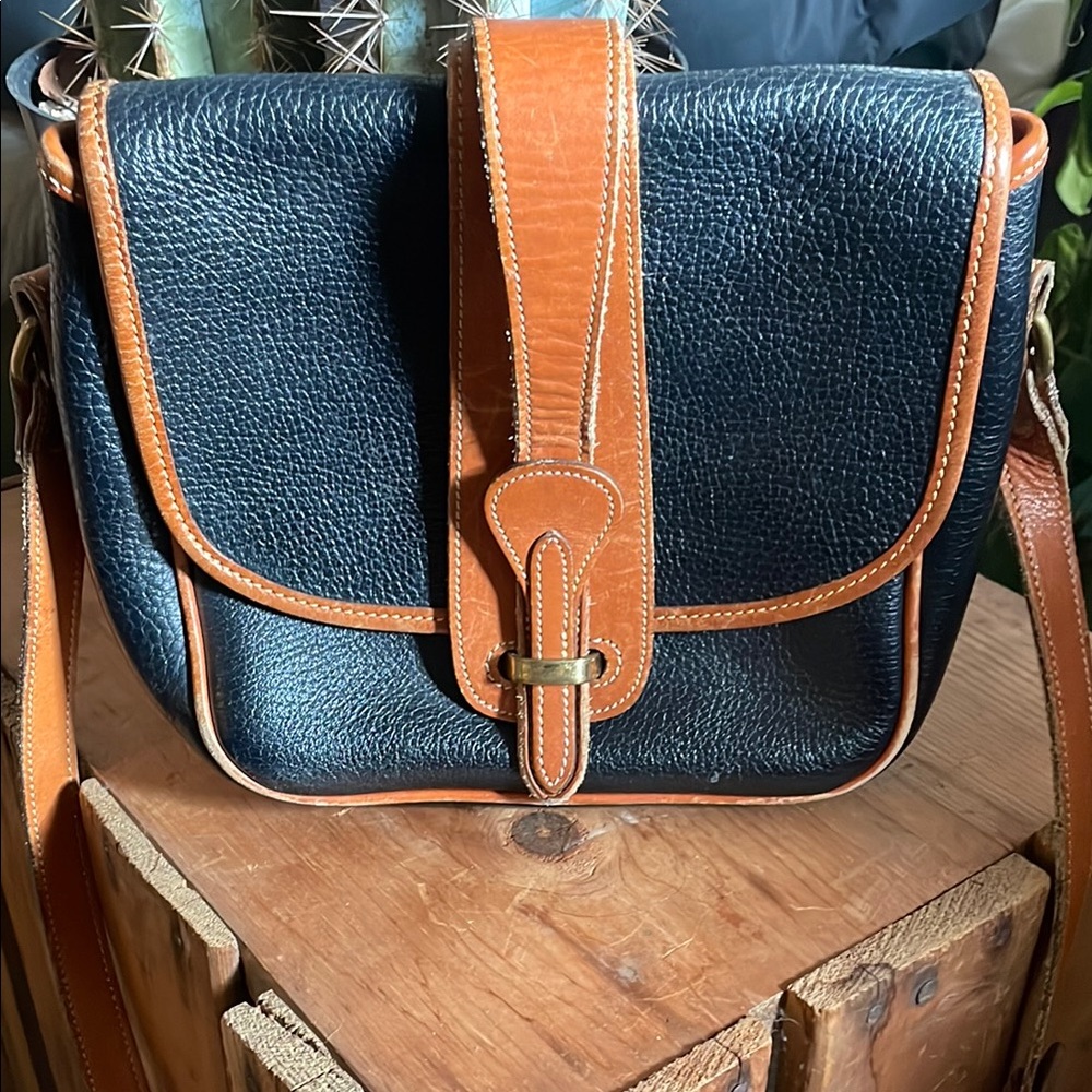 Black Crossbody Bag with Tan Trim and Structured Shape